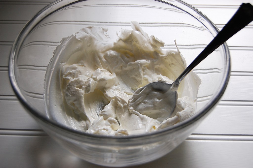 mixing sour cream and cream cheese