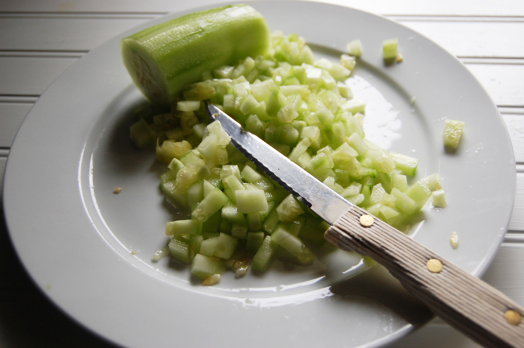 chopping cucumber