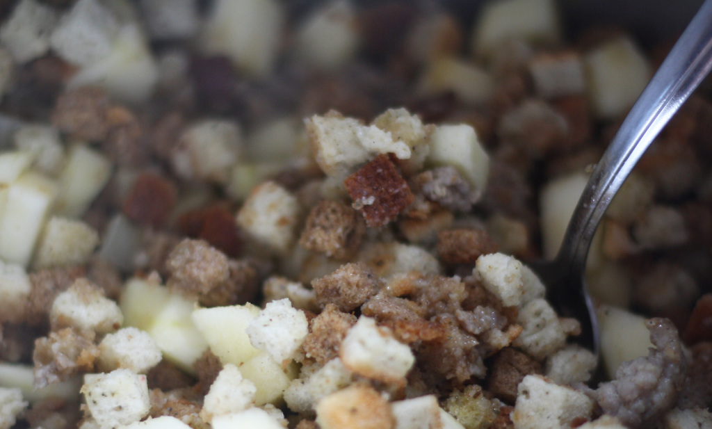 adding stuffing and apples