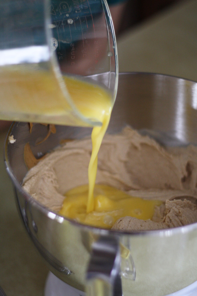 adding egg to star cookies