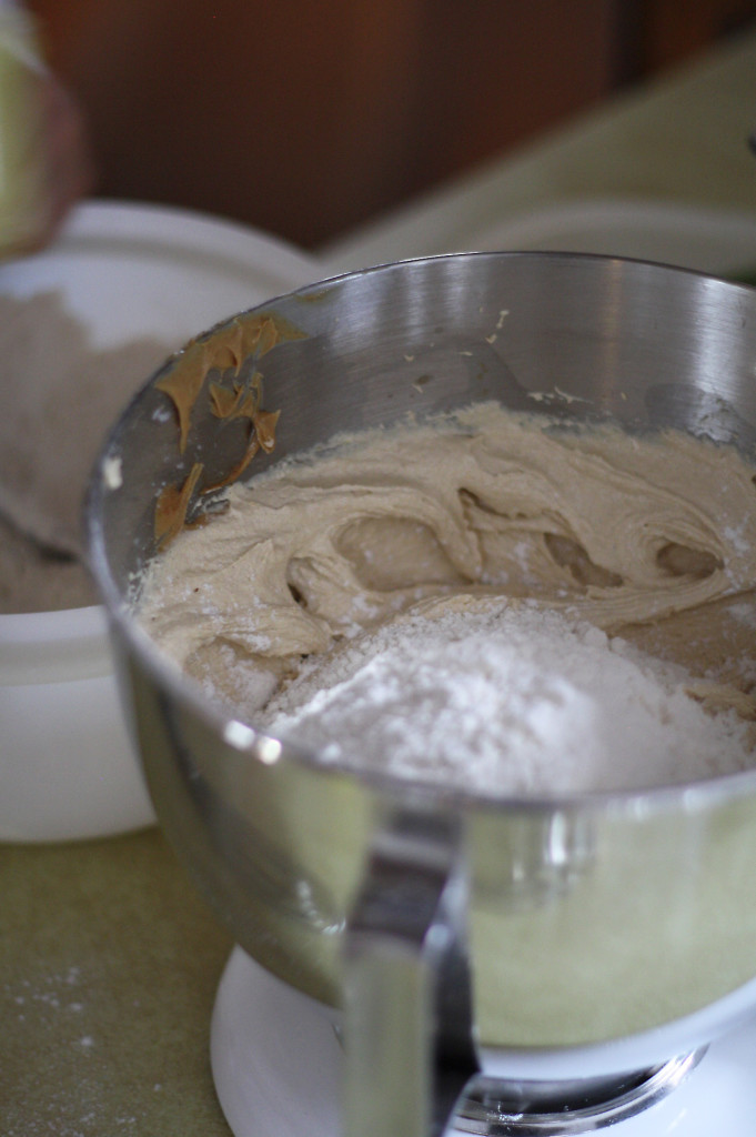 adding flour to star cookies