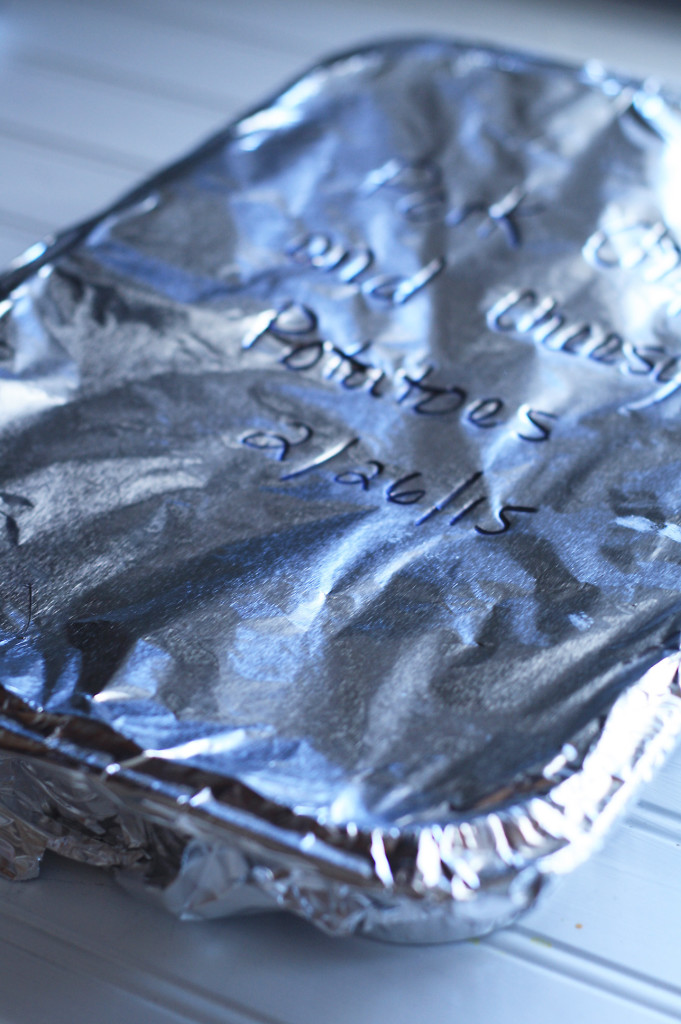 foil covered pork chops and cheesy potatoes