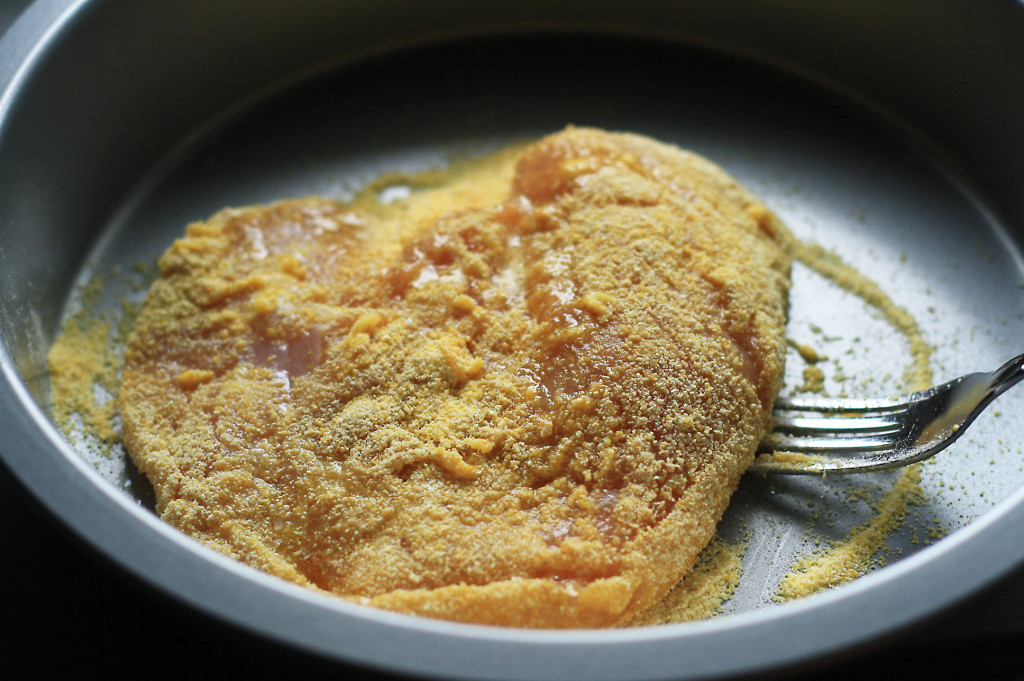 chicken in second dipping in the batter