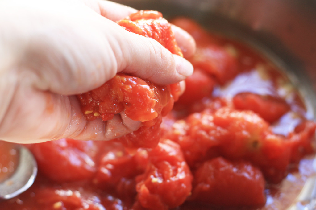 crushing tomatoes