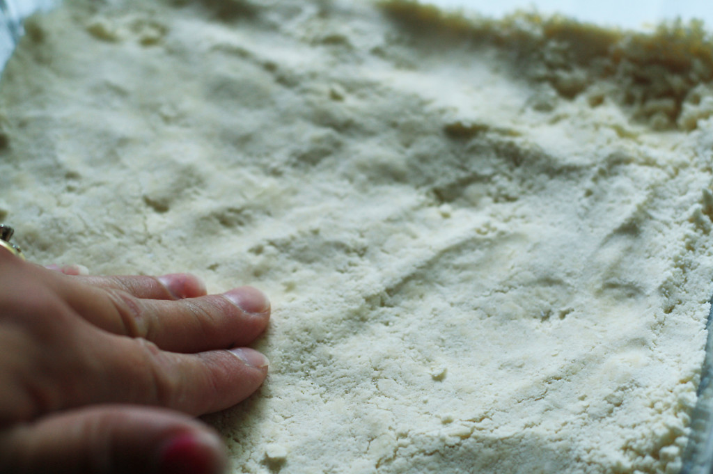 patting crust in pan